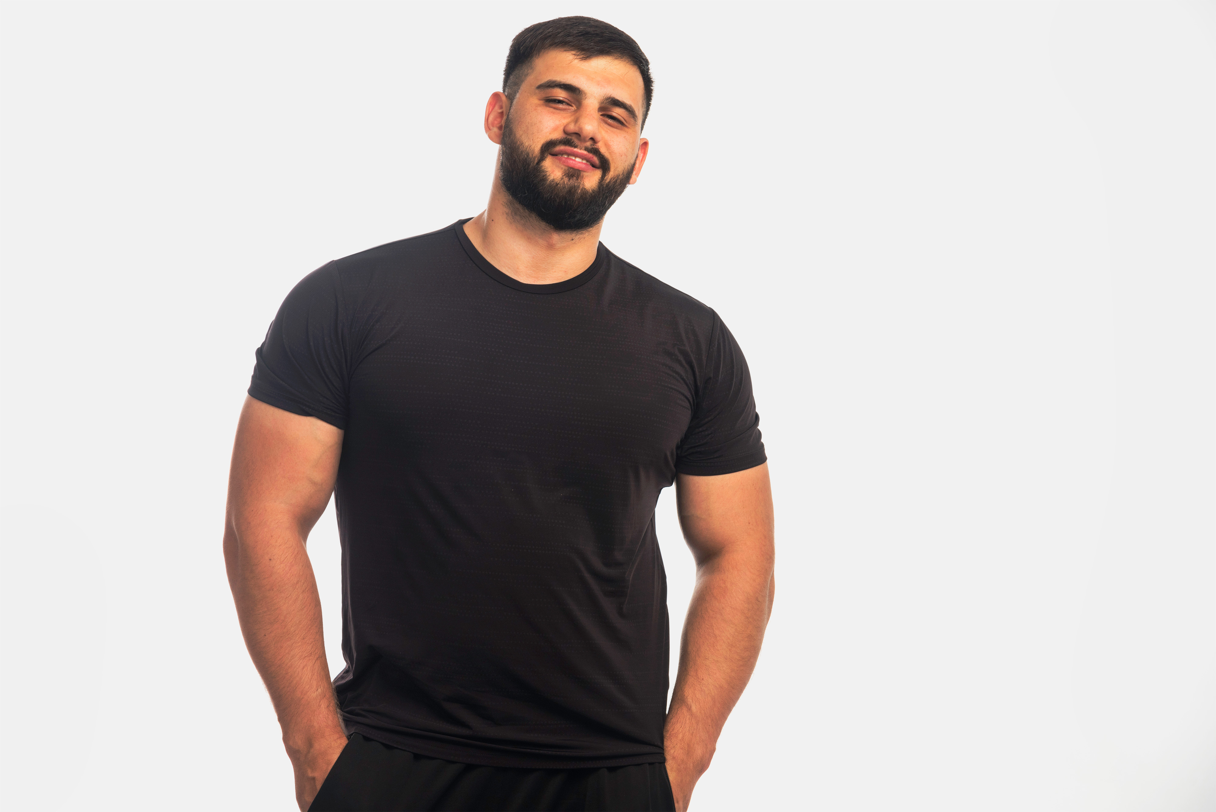 sportive-man-black-shirt-posing.jpg